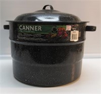 21 QUART CANNER WITH RACKS AND JAR LIFTER.