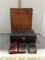 Pocket Bibles, notebook and storage box