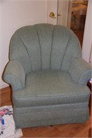 Sea green upholstered armchair