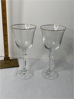 2 wine glasses with gold trim