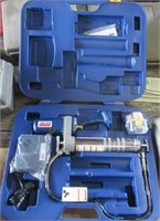 Lincoln 12 volt battery grease gun with case.