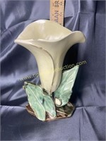 Mccoy pottery lily vase has chip