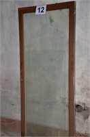 Antique sliding door from men's suit display