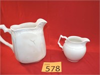 Two Vintage White Pitchers