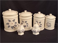 (4) Piece floral canister set with creamer and