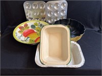 Assorted kitchen items including enamelware,