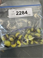 2 BAGS OF MARBLES--BLACK/ YELLOW