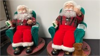 2 12” sitting Santa clauses