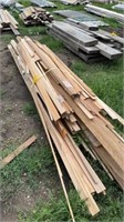 PILE OF OAK TRIM, BASE AND CASING