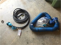 RV 30 amp power cord & unused black water hose