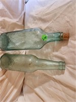 2 vintage collector bottles