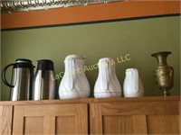 coffee caraffes pots and a vase