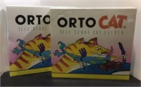 Two new Orto cat self-serve cat feeders. Boxes