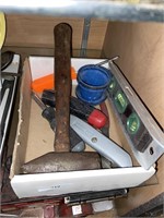 assorted tools including hammer level screwdriver