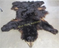 Black bear rug 61x51 claws on 1 paw only