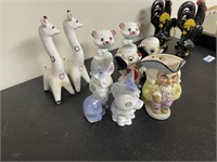 8 salt and pepper shakers, and drinking stein