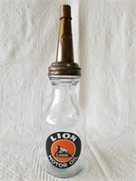 Vintage-style Lion Brand Glass Motor Oil Bottle