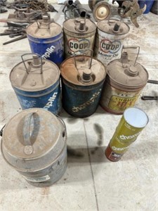 Vintage oil cans and water cooler