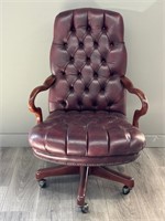 Button Tufted Burgundy Leather Swivel Chair