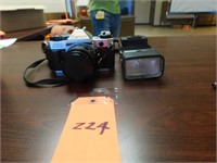 Lot 224  Canon AE-1 Camera and Flash.