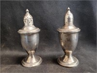 Two Sterling Weighted Shakers