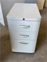 Very Hard Plastic 3 drawer file cabinet on wheels