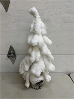 Fluffy white tree measuring 24 inches tall