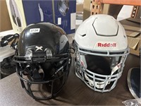 Lot of 2 football helmets 1 xenith youth medium