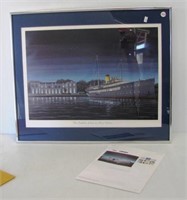 Framed and matted print of the Delphine docked at