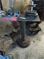 Homemade steel stand with contents.