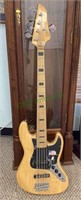 SX five string electric bass guitar made from