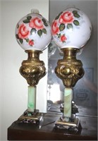 Pair of floral globes and marble base lamps