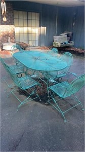 Vintage green wrought iron patio set with 6