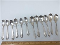 12 spoons all Marked Sterling 105 G