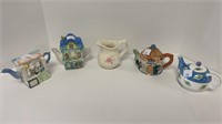 (4) mini teapots & cream pitcher