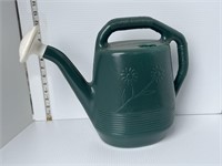 Green watering can