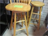Four wooden bar stools -