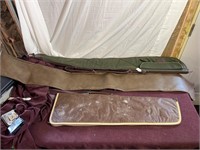 Three soft side rifle cases
