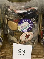 Jar of key chains and misc. items