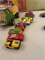 11 matchbox cars,  played with conditon
