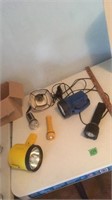 Assorted flashlights and lamp