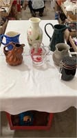 Porcelain pitchers, floral vase