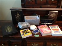 Books, Bible, clock radio and cards