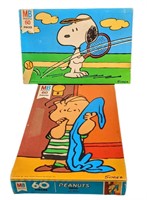 Two Vintage Peanuts Linus And Snoopy Puzzles