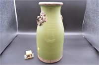 Large green ceramic vase with handles