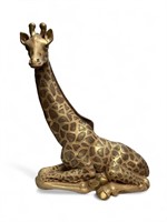Massive ceramic laying giraffe calf sculpture