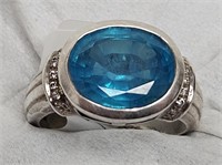 RING MARKED 925 SILVER LIGHT BLUE STONE