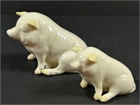 Belleek Ireland Parian china sitting pigs.