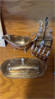 Four pieces of silver plate, four sliced toast,