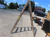 Wood folding ladder.